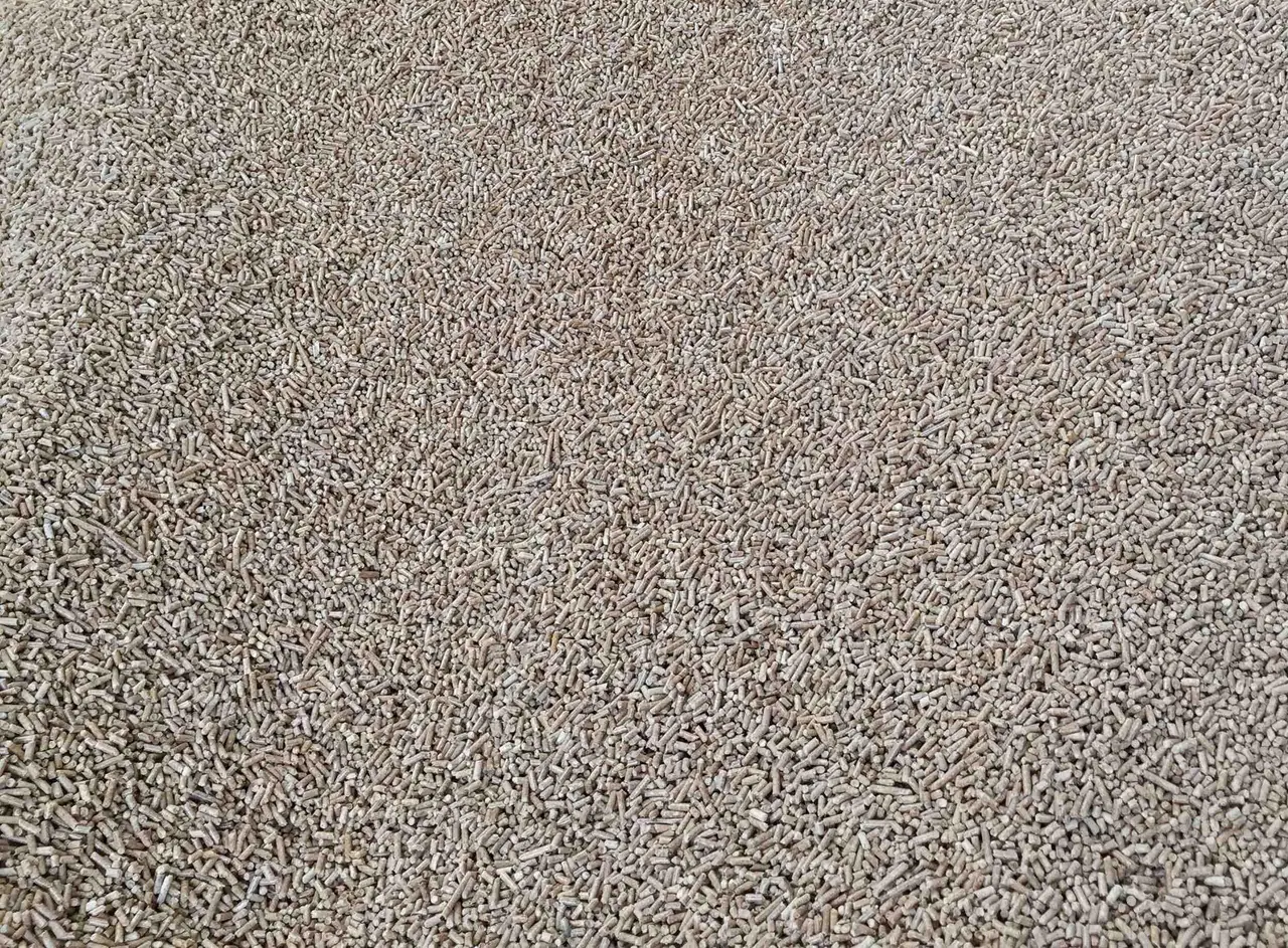Industrial biomass pellets as a densified dry feedstock product
