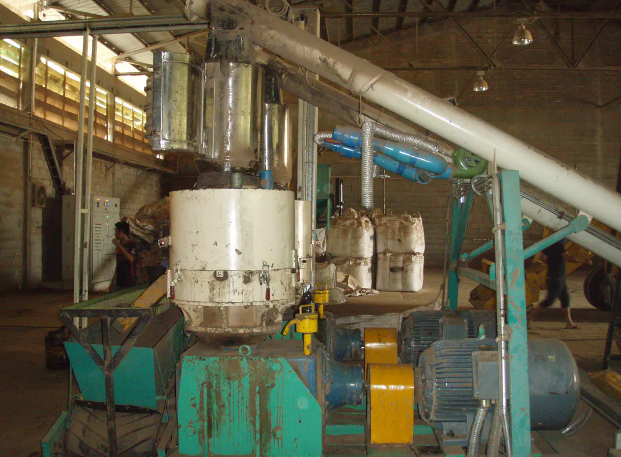 Industrial handling equipment for biomass residues and processing co-products