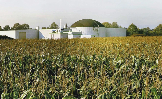 Biogas installation located beside a harvested sorghum crop